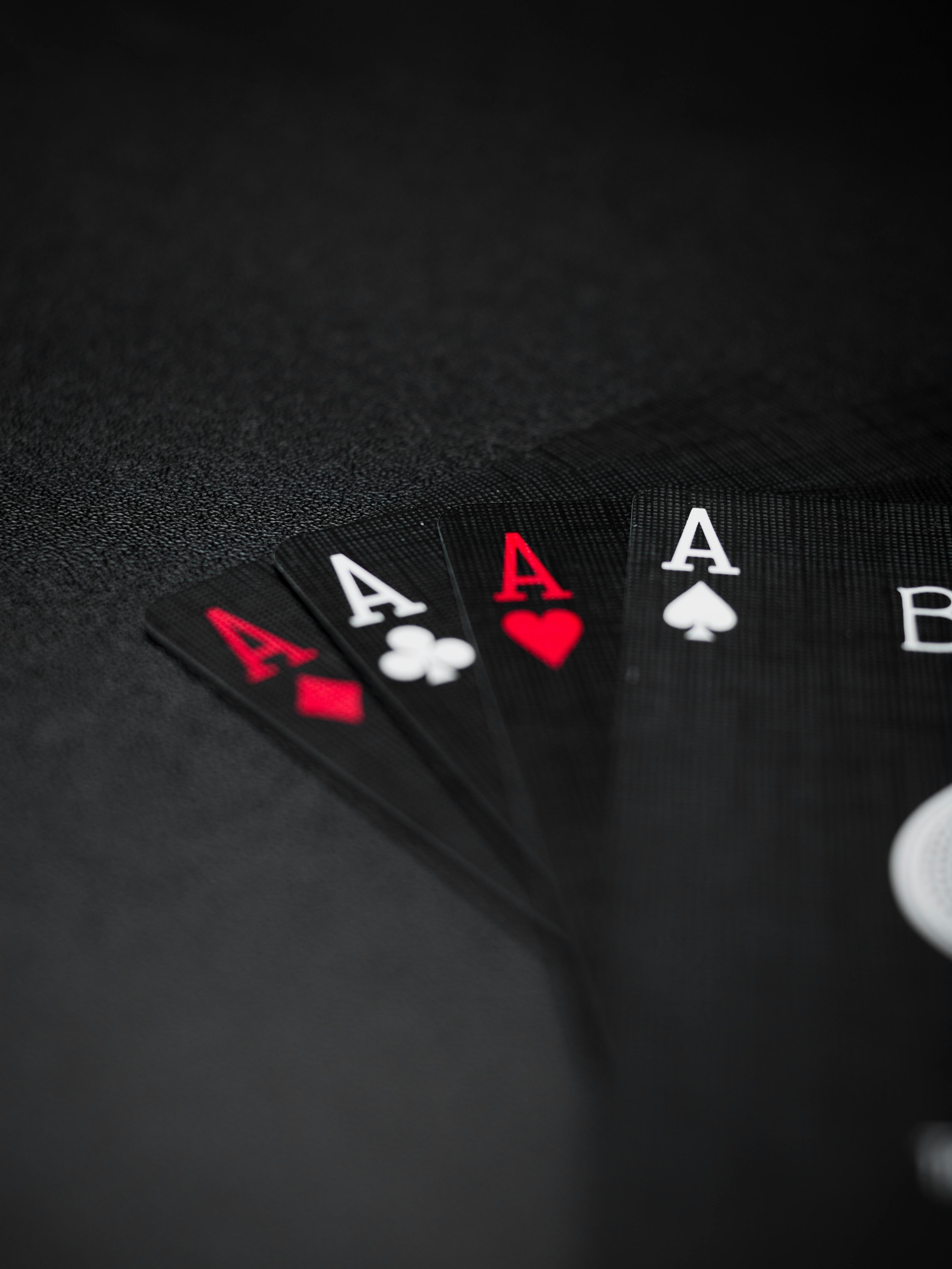 A playing card on a dark surface